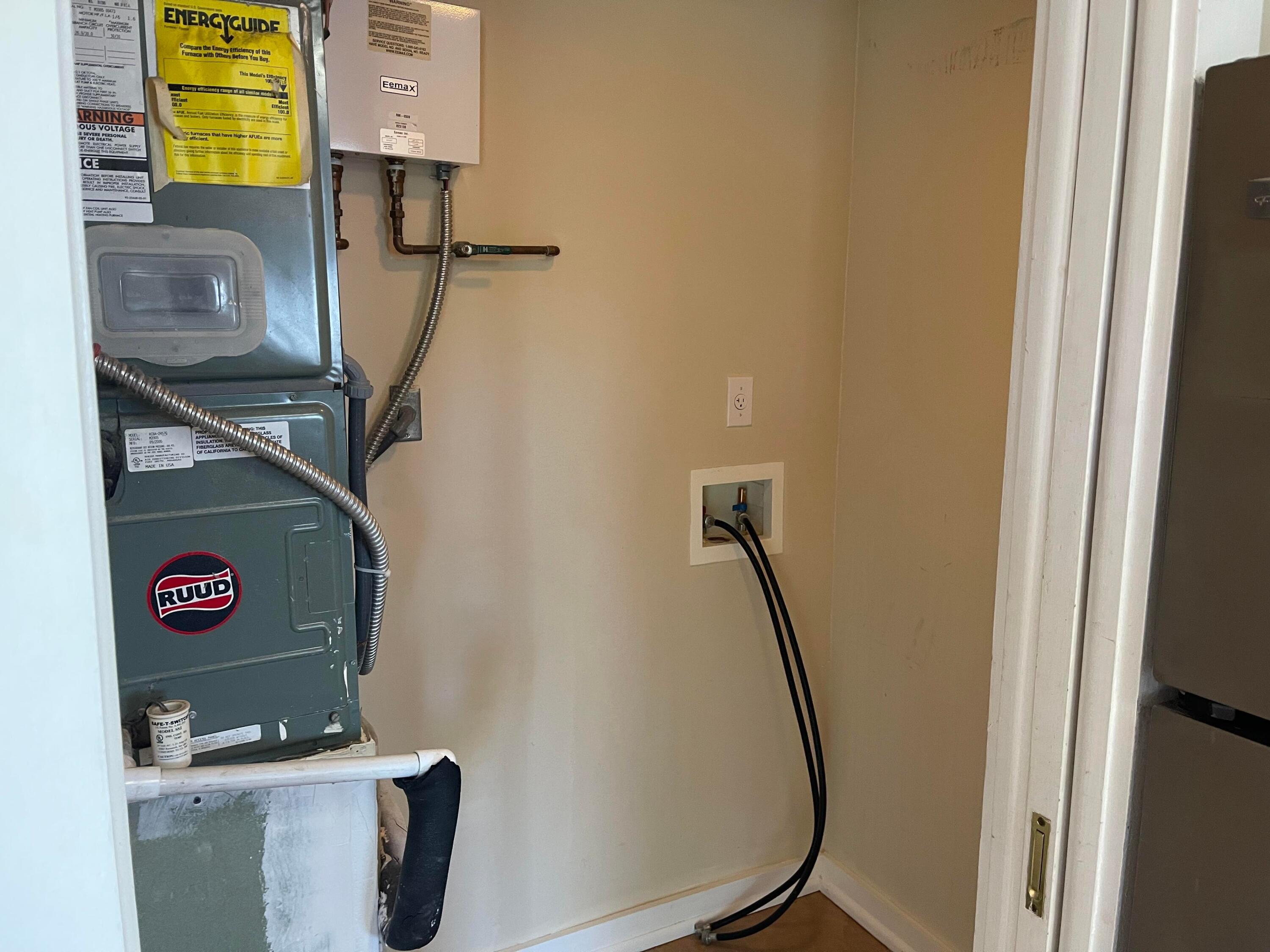 201 Coppitt Road, Unit 104B Key West, FL 33040 - Photo 8 of 13 a utility room with dryer and washer