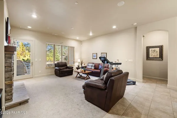 a living room with furniture and a couch