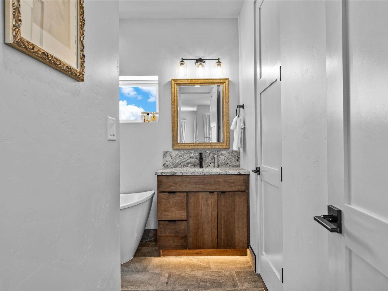365 West Ridges Boulevard, Unit A Grand Junction, CO 81507 - Photo 28 of 42 a bathroom with a sink and a mirror