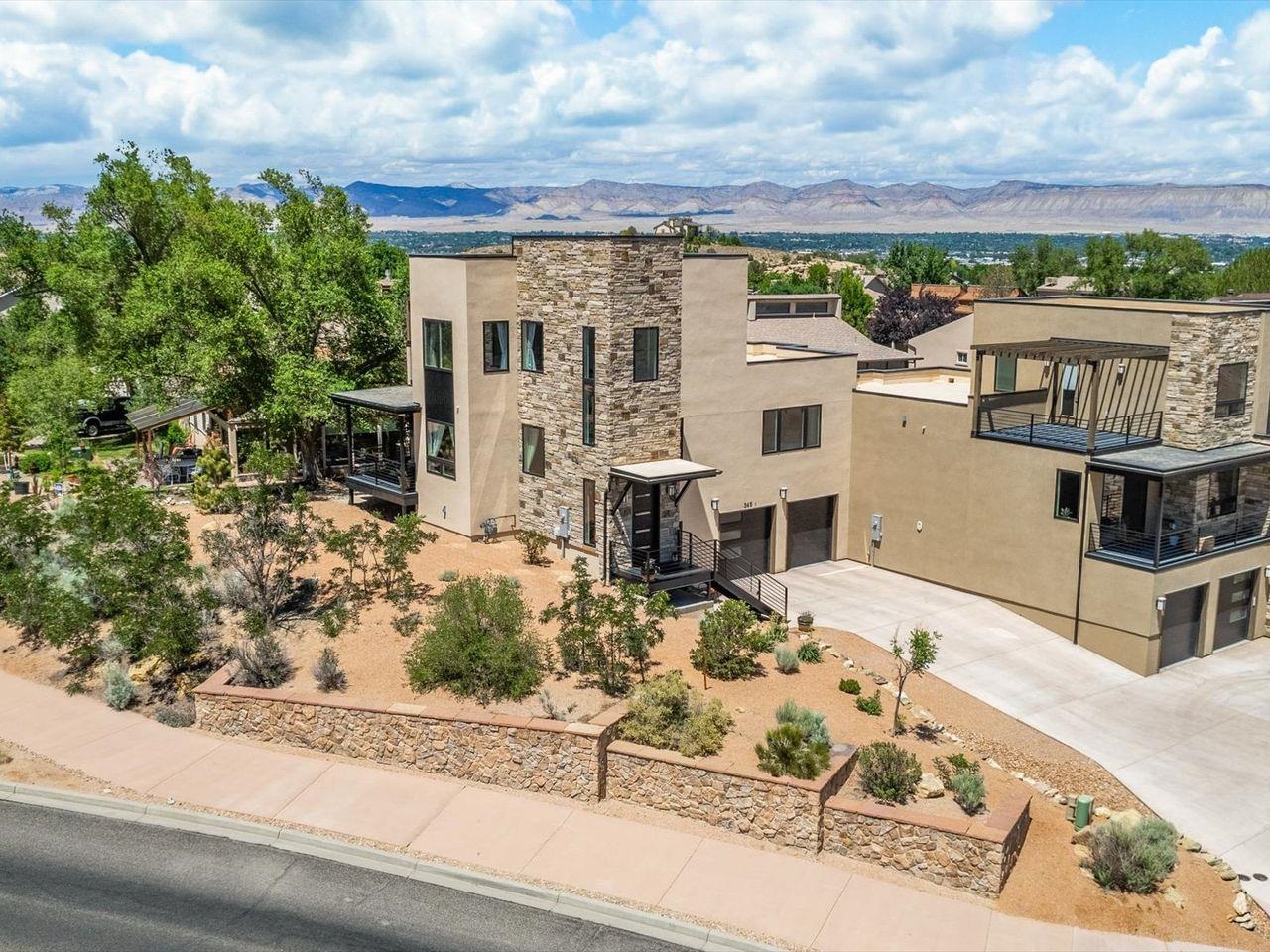 365 West Ridges Boulevard, Unit A Grand Junction, CO 81507 - Photo 40 of 42 front view of a house with a yard