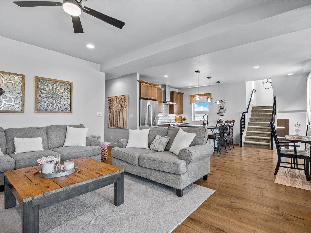 365 West Ridges Boulevard, Unit A Grand Junction, CO 81507 - Photo 10 of 42 a living room with furniture and wooden floor