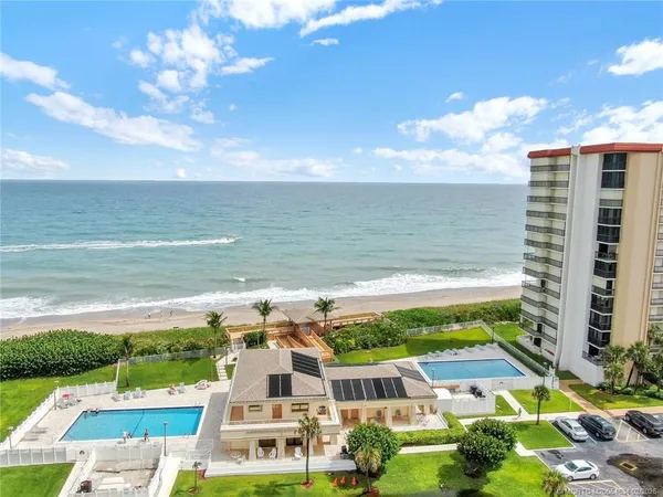 a view of a city with an ocean view