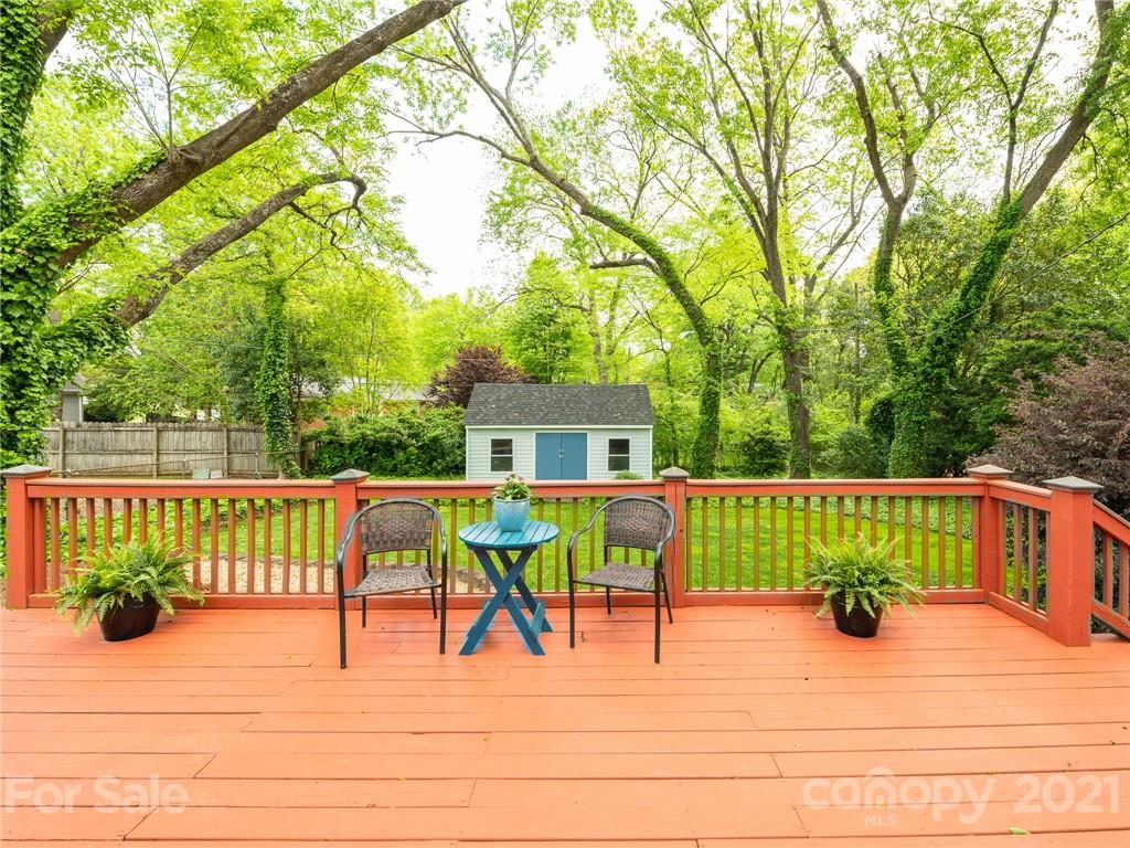 5417 Valley Forge Road Charlotte, NC 28210 - Photo 3 of 18 a view of a deck with couches table and chairs