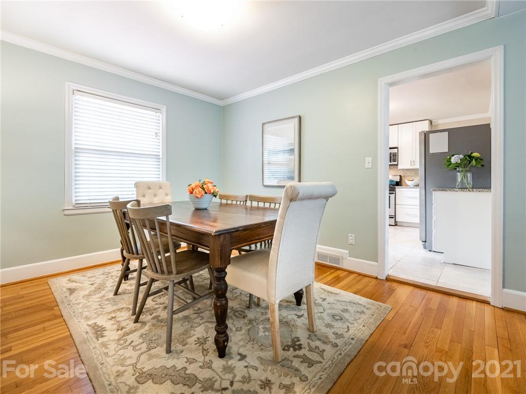 5417 Valley Forge Road Charlotte, NC 28210 - Photo 8 of 18 a view of a dining room with furniture window and wooden floor