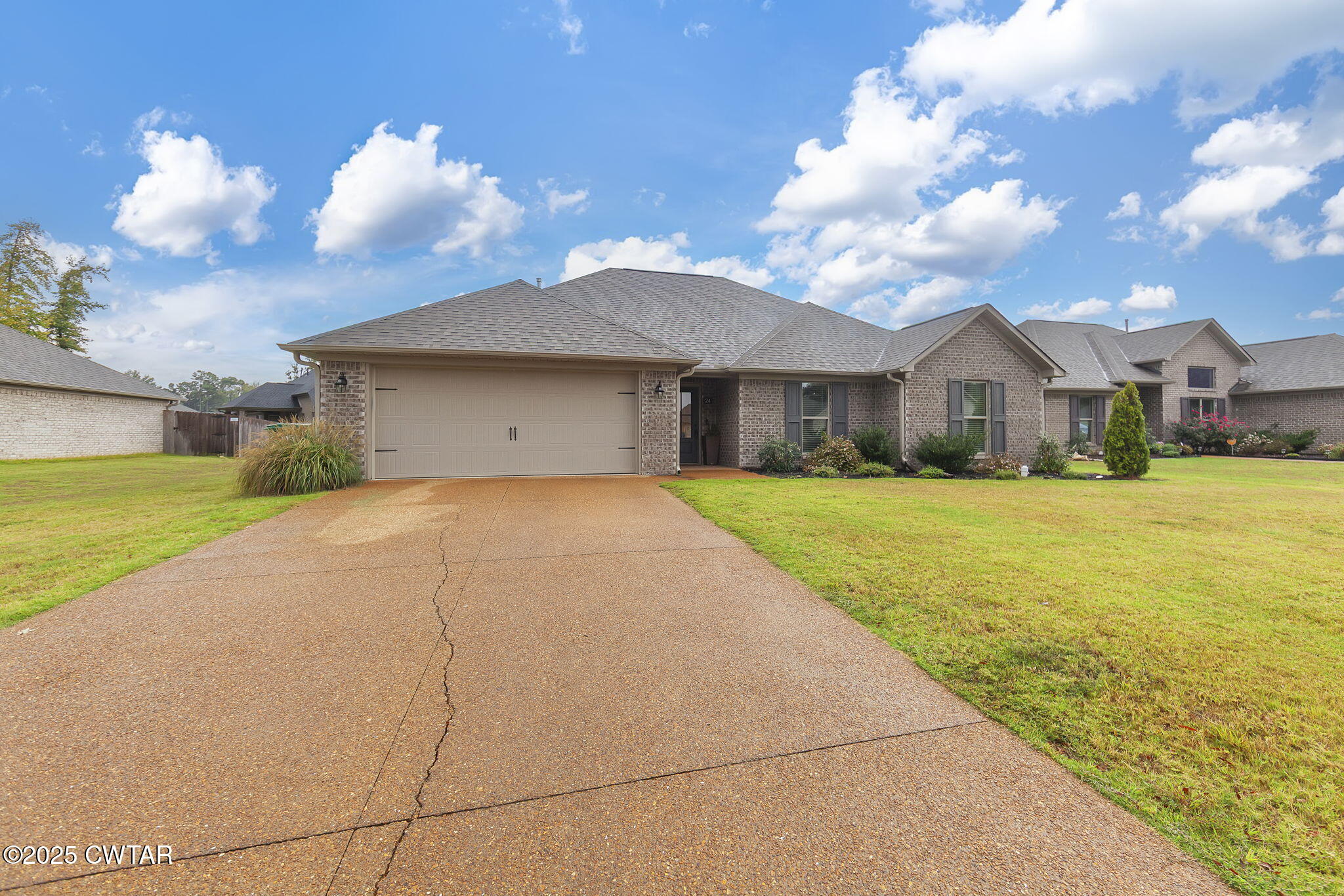 a view of house with yard