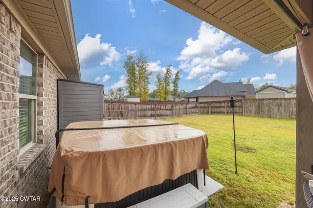 a view of a swimming pool with a lawn chairs