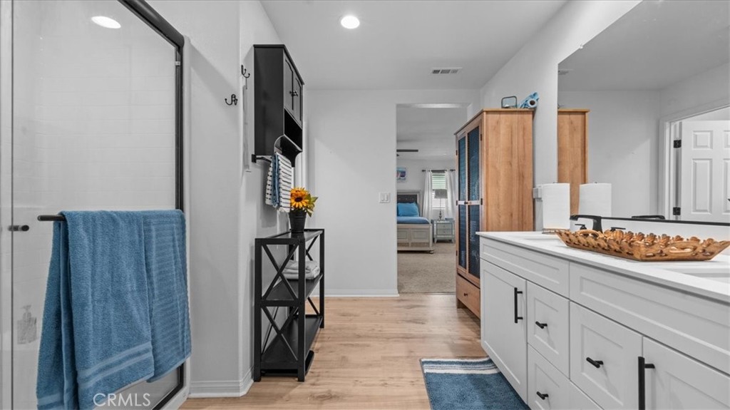 35580 Roxy Road Beaumont, CA 92223 - Photo 16 of 39 a hall with a sink and refrigerator