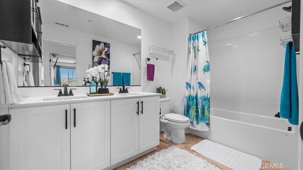 35580 Roxy Road Beaumont, CA 92223 - Photo 21 of 39 a bathroom with a sink toilet and shower