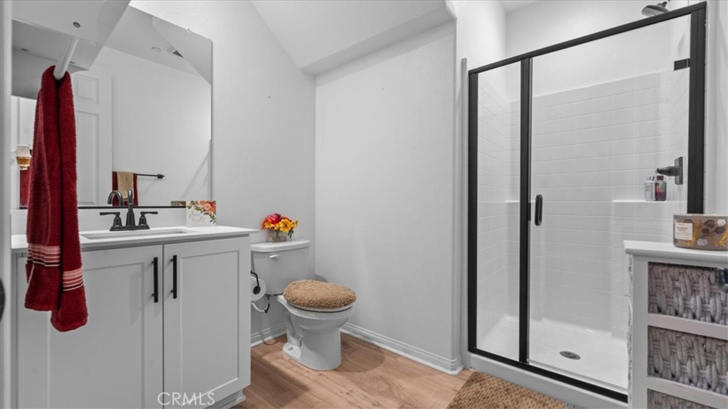 35580 Roxy Road Beaumont, CA 92223 - Photo 24 of 39 a bathroom with a sink toilet and shower