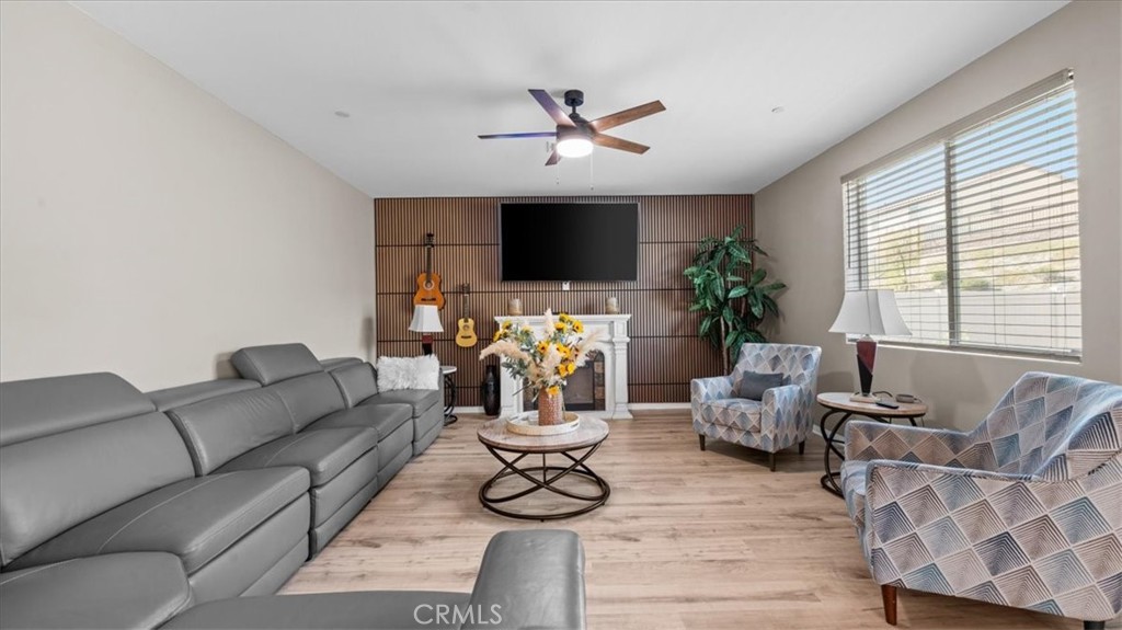 35580 Roxy Road Beaumont, CA 92223 - Photo 3 of 39 a living room with furniture fireplace and window