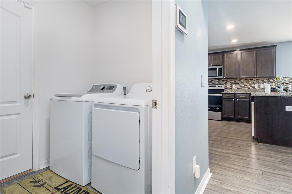 1760 Canaan Loop Dundee, FL 33838 - Photo 12 of 25 a room with storage and utility