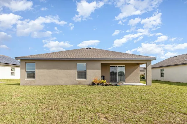 a front view of house with yard