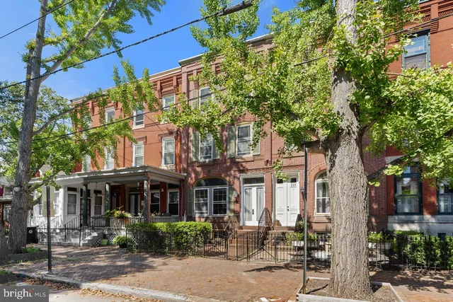a front view of a building with street view