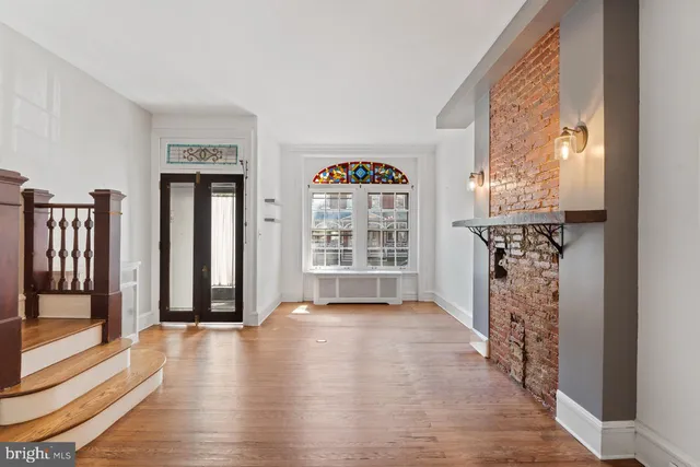a view of livingroom with furniture and wooden floor