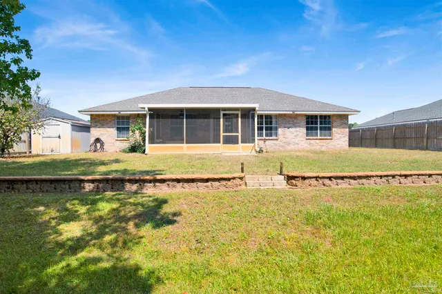 a front view of a house with swimming pool