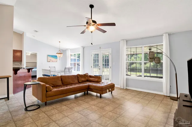 a living room with furniture and a window