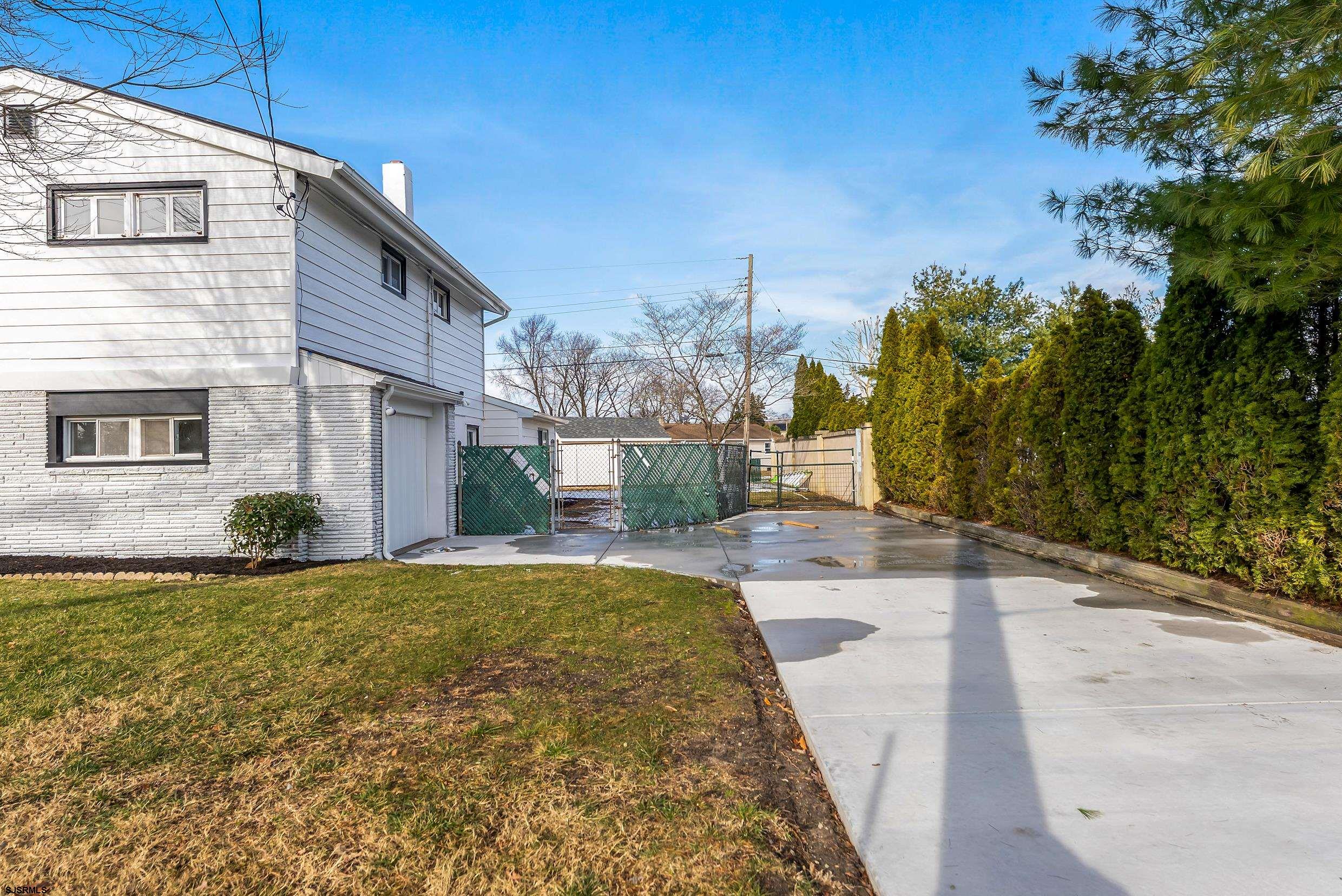 1805 Zion Road Northfield, NJ 08225 - Photo 23 of 25 a view of a house with backyard and trees