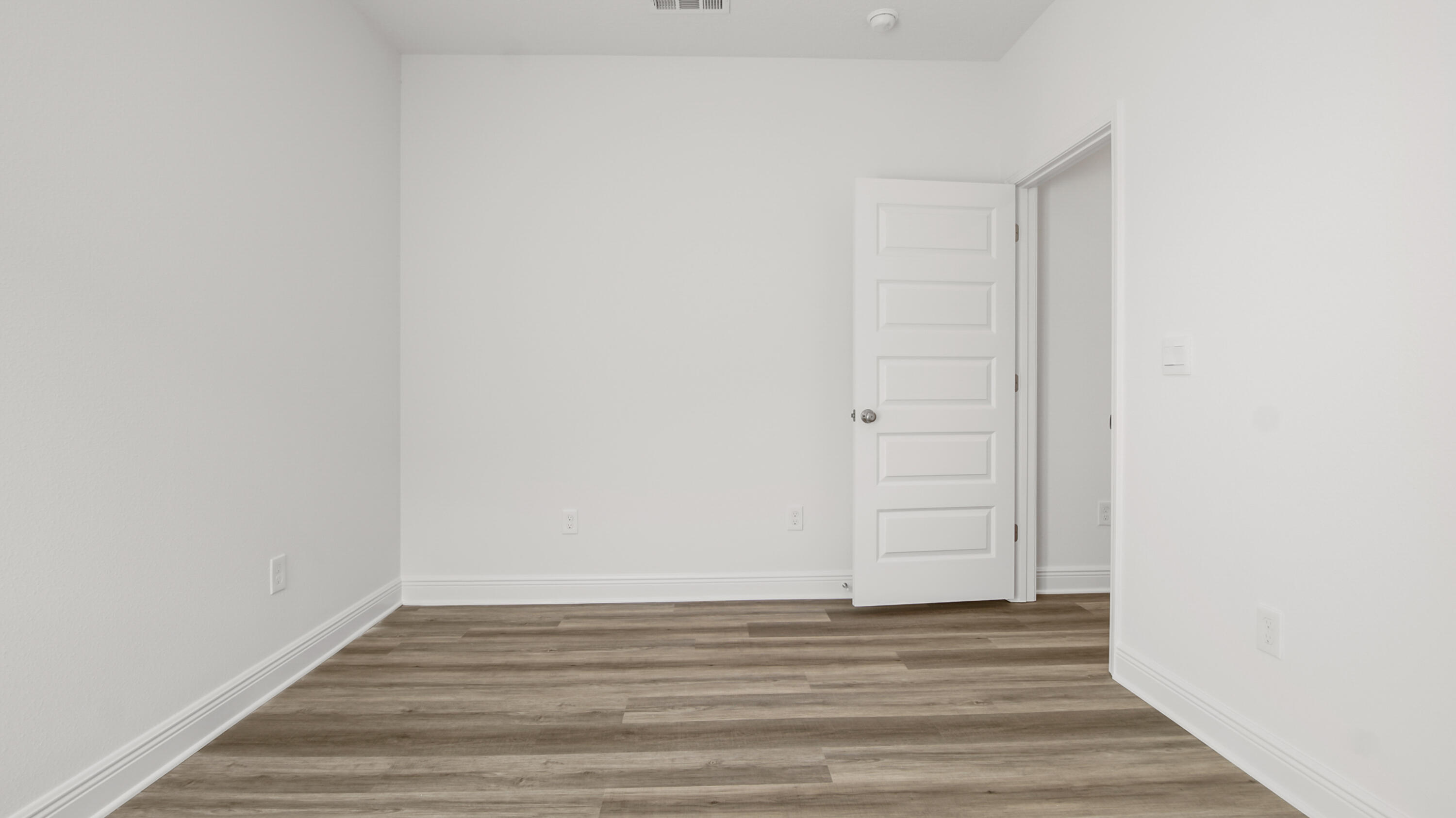 76 Grass Owl Loop Freeport, FL 32439 - Photo 21 of 39 a view of a small space with wooden floor