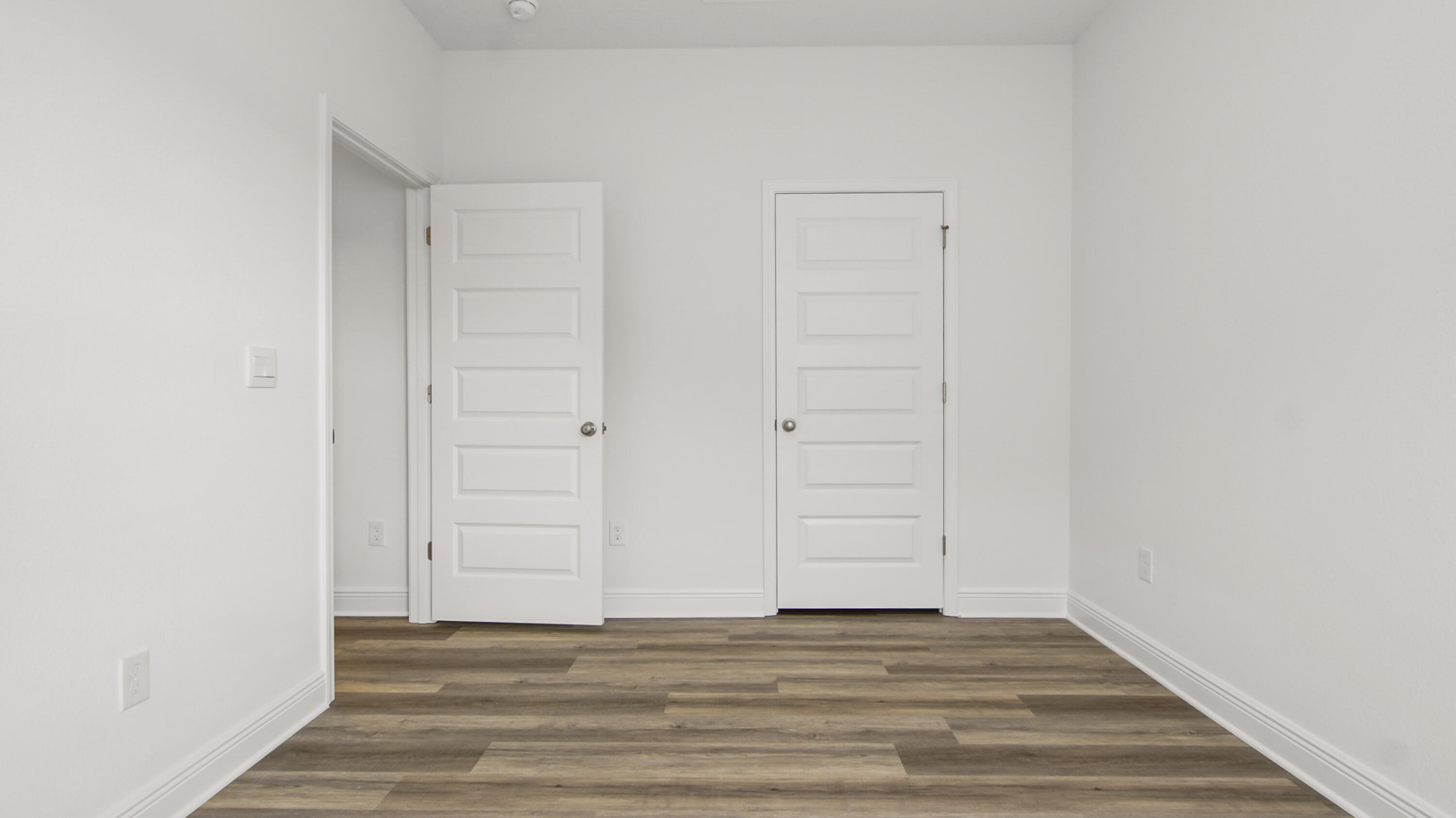 76 Grass Owl Loop Freeport, FL 32439 - Photo 23 of 39 a view of a livingroom with wooden floor