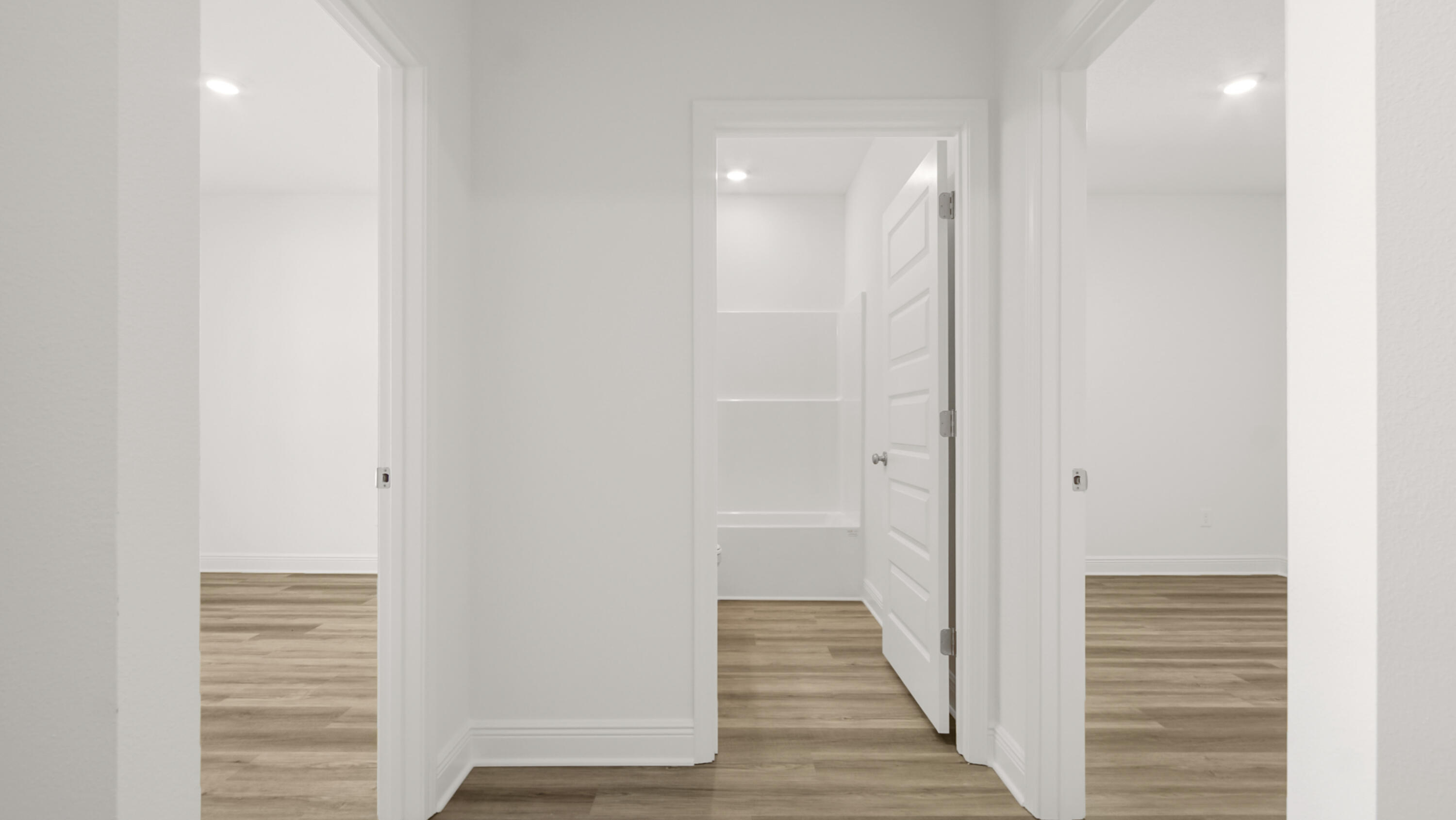 76 Grass Owl Loop Freeport, FL 32439 - Photo 4 of 39 a view of a hallway with wooden floor