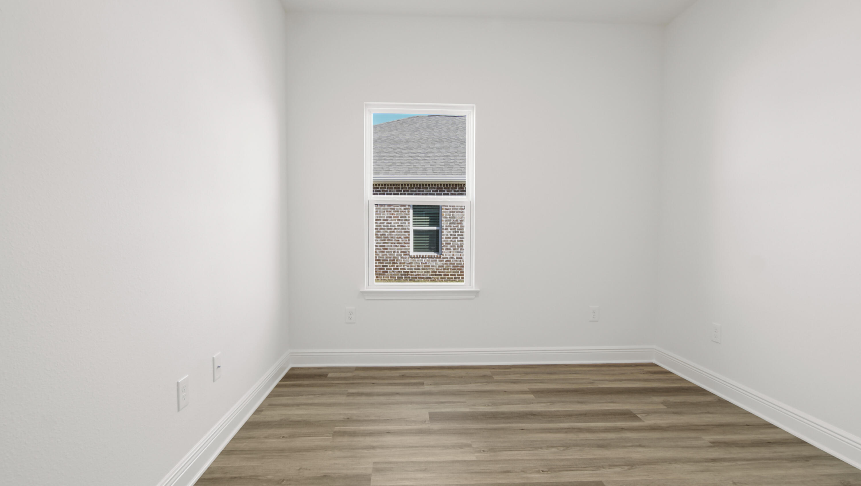 76 Grass Owl Loop Freeport, FL 32439 - Photo 7 of 39 a view of a small space with wooden floor and a window