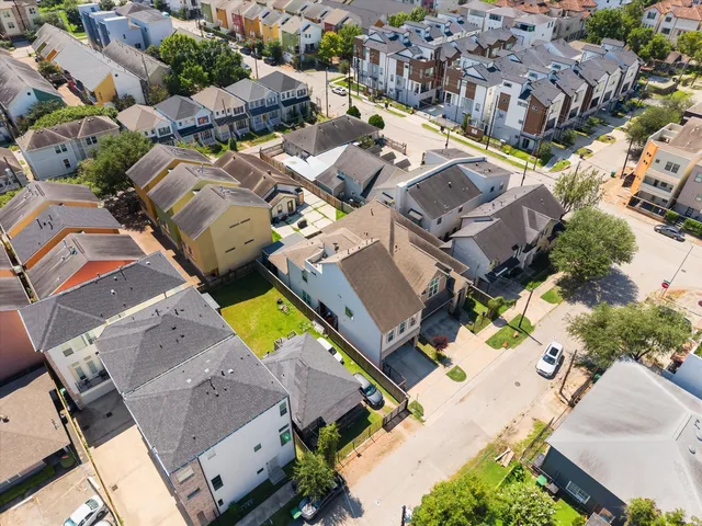 an aerial view of residential house with swimming pool