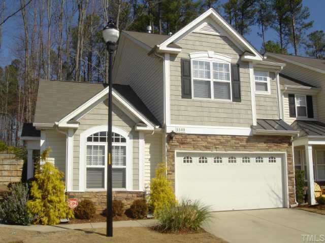 8508 Flying Buttress Drive Raleigh, NC 27613 - Photo 12 of 12 a front view of a house with a yard