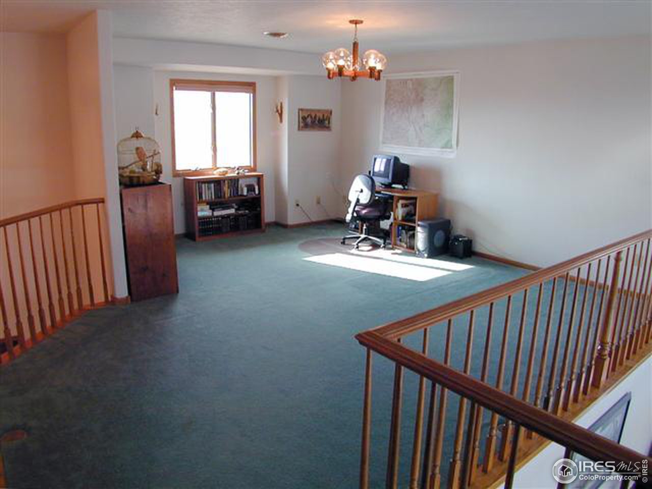 7090 Spring Glade Road Loveland, CO 80538 - Photo 14 of 18 a view of a livingroom with furniture and windows