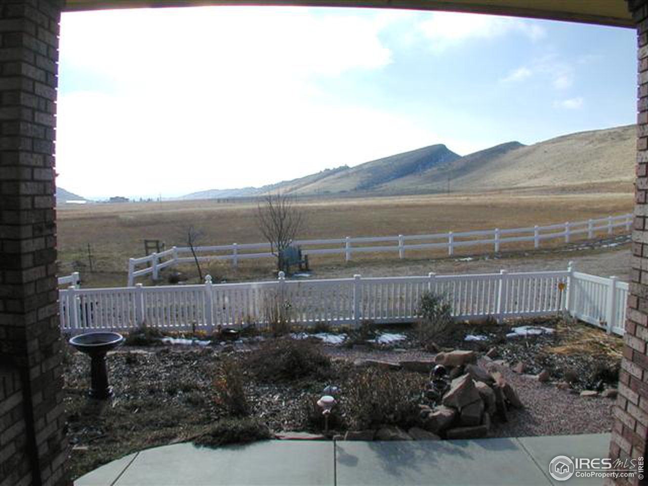 7090 Spring Glade Road Loveland, CO 80538 - Photo 5 of 18 a view of outdoor space and car parked