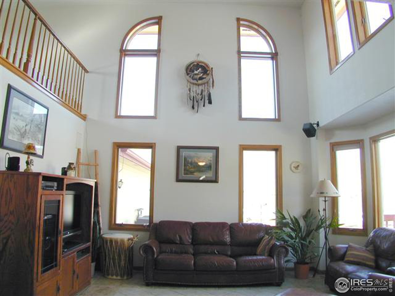 7090 Spring Glade Road Loveland, CO 80538 - Photo 6 of 18 a living room with furniture and a window