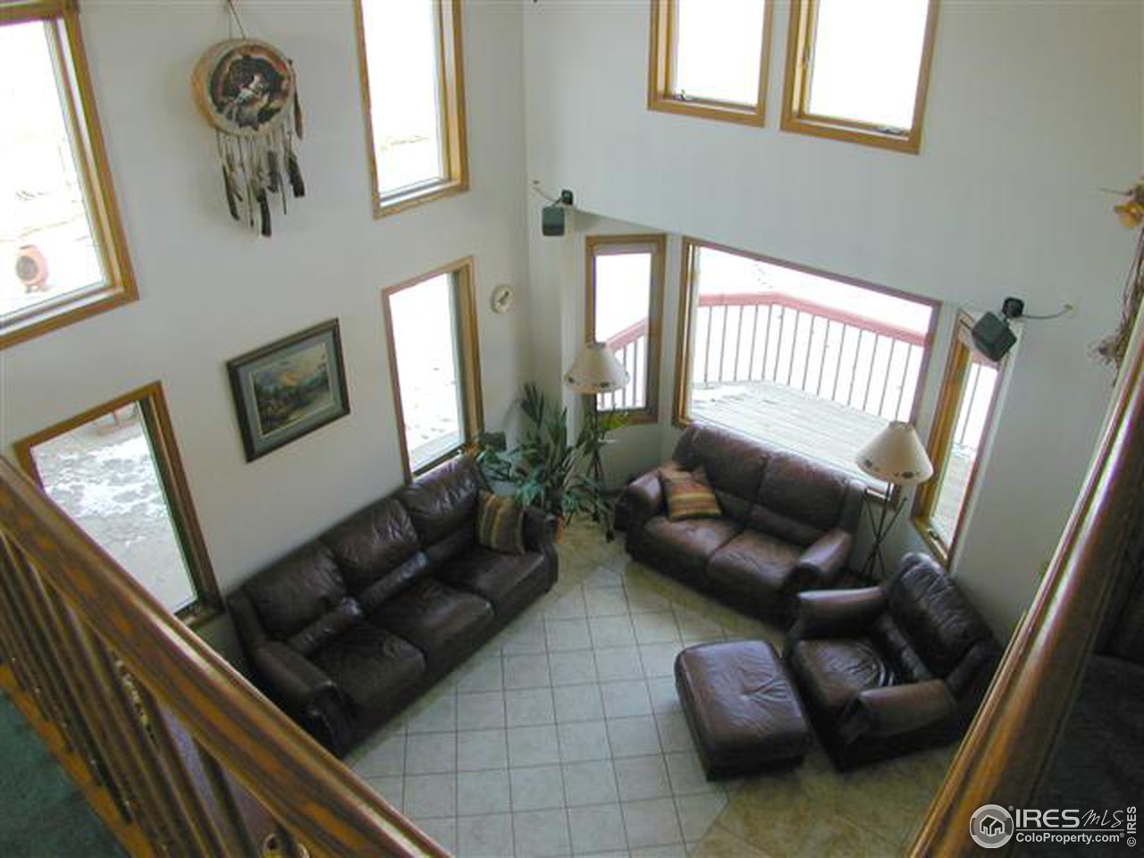 7090 Spring Glade Road Loveland, CO 80538 - Photo 7 of 18 a living room with furniture and a window