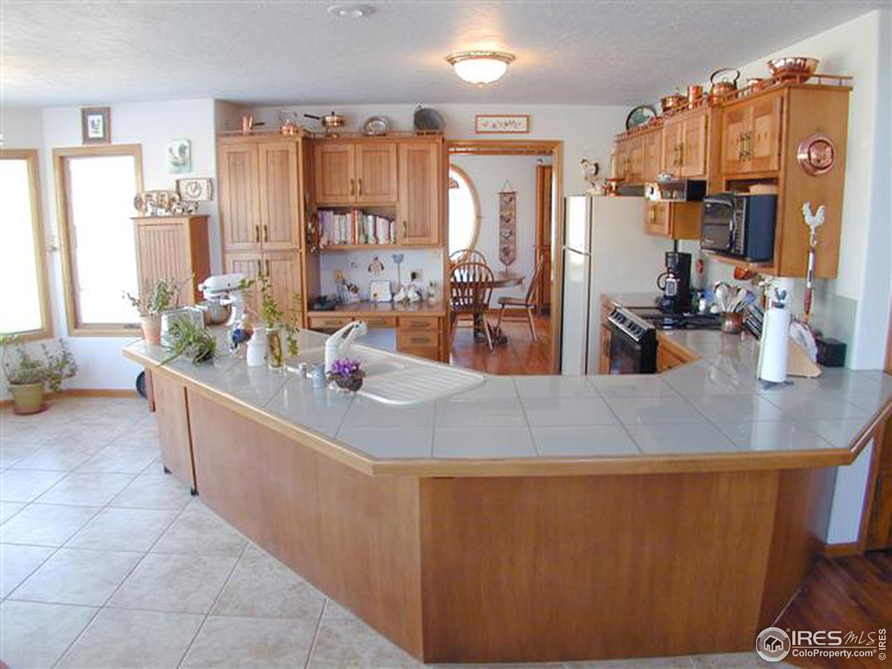 7090 Spring Glade Road Loveland, CO 80538 - Photo 8 of 18 a view of living room with furniture and window