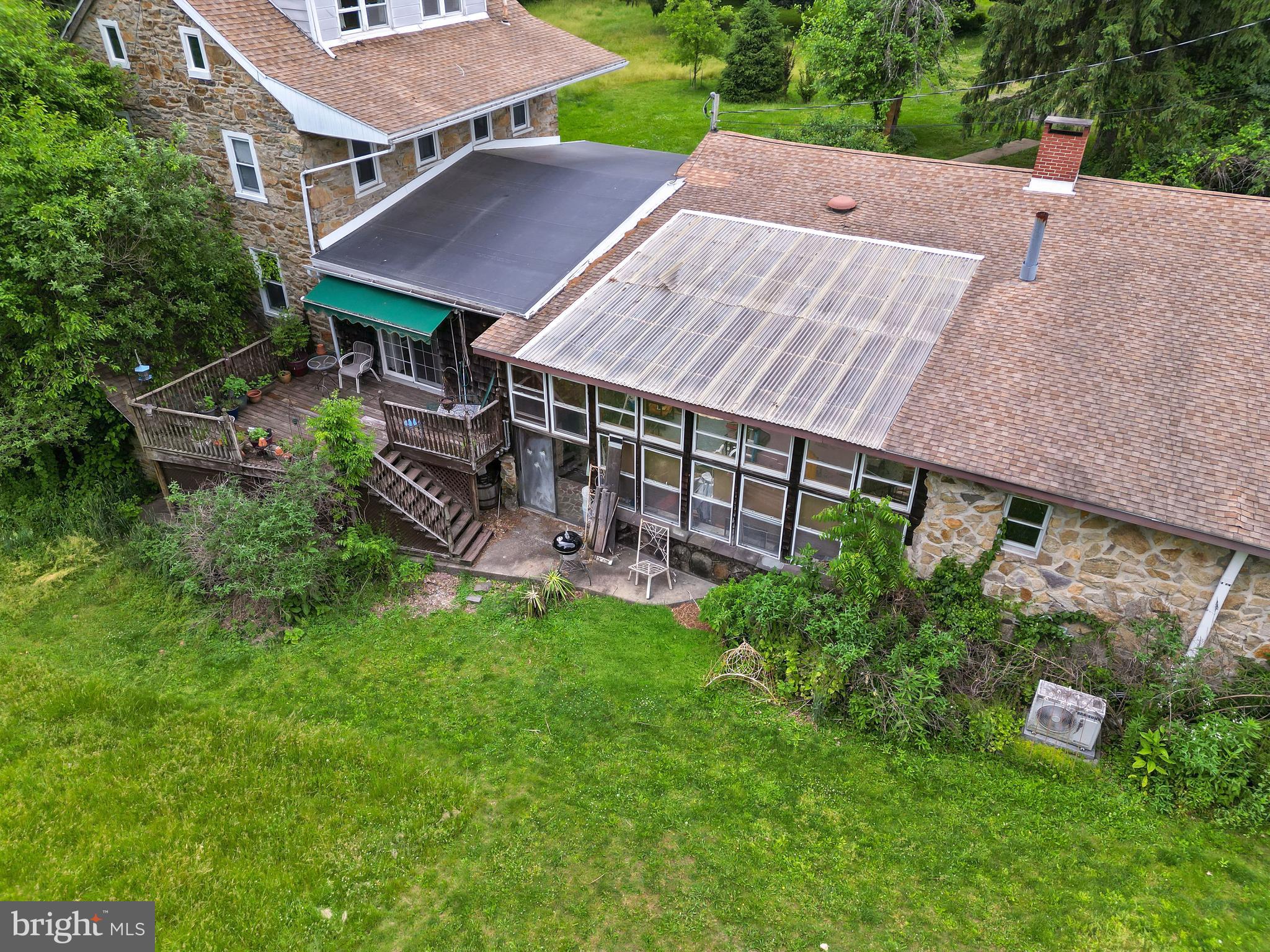 564 Blandon Road Fleetwood, PA 19522 - Photo 8 of 45 a aerial view of a house with a yard table and chairs