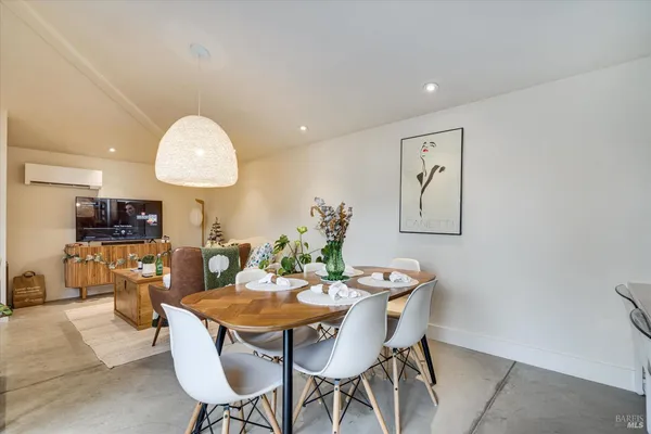 a view of a dining room with furniture