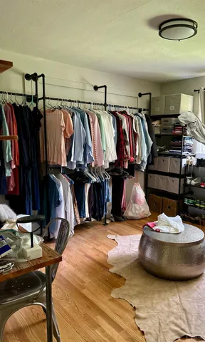 a kitchen with a sink a stove and a refrigerator