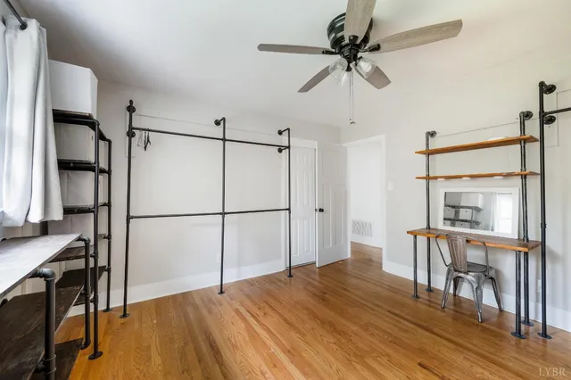 a bathroom with a tub sink and shower