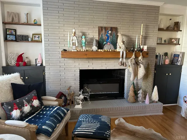 a kitchen with white cabinets and sink