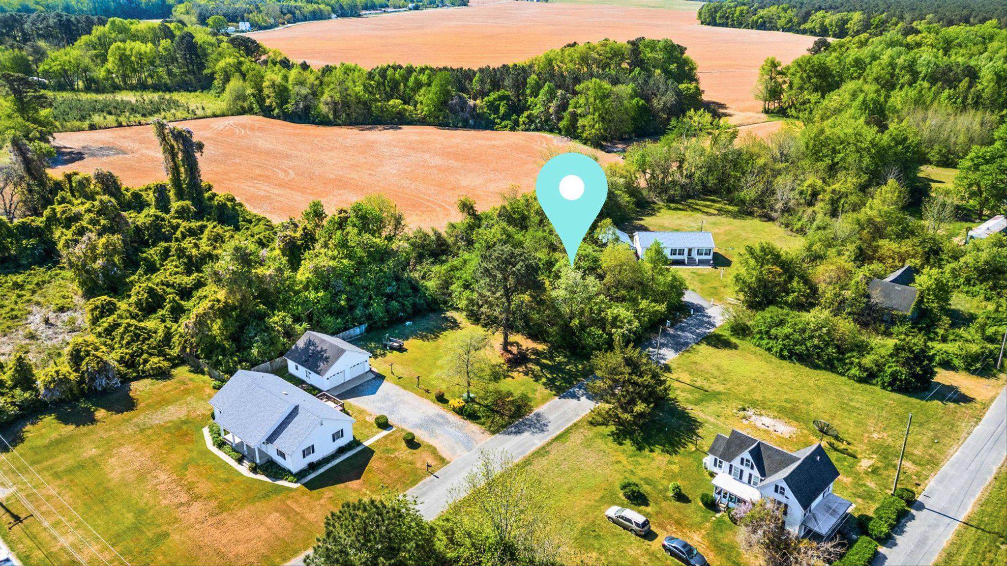 an aerial view of a house having yard