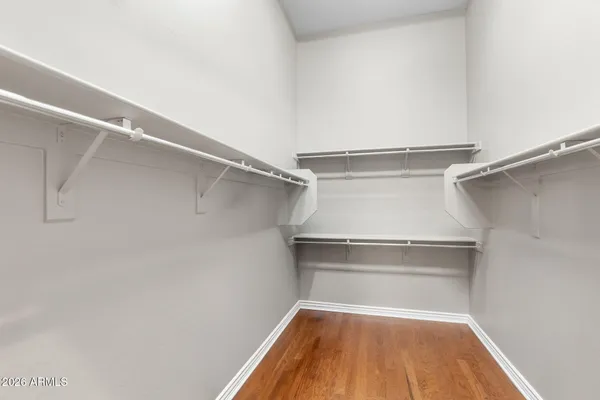 a view of a swimming pool with sitting area