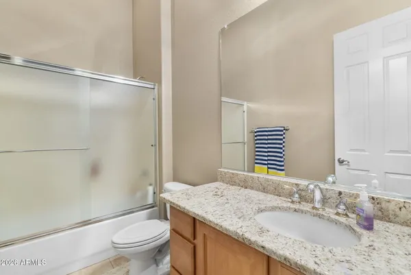 a view of a city with mountains in the background