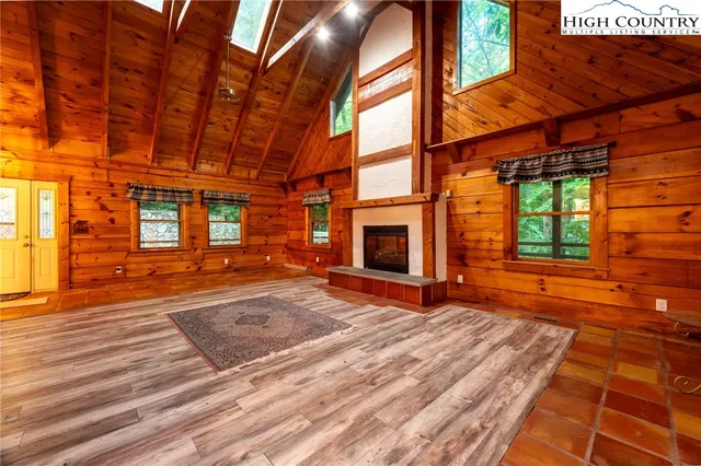 a bathroom with a sink mirror and toilet