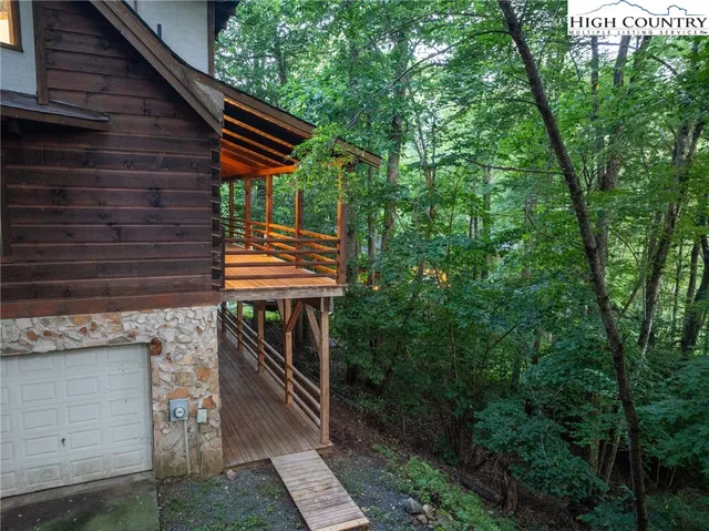 a view of backyard with green space