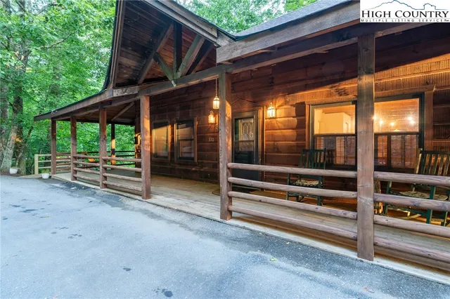 a view of outdoor space with wooden floor and deck
