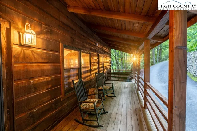 a view of outdoor space with deck and furniture