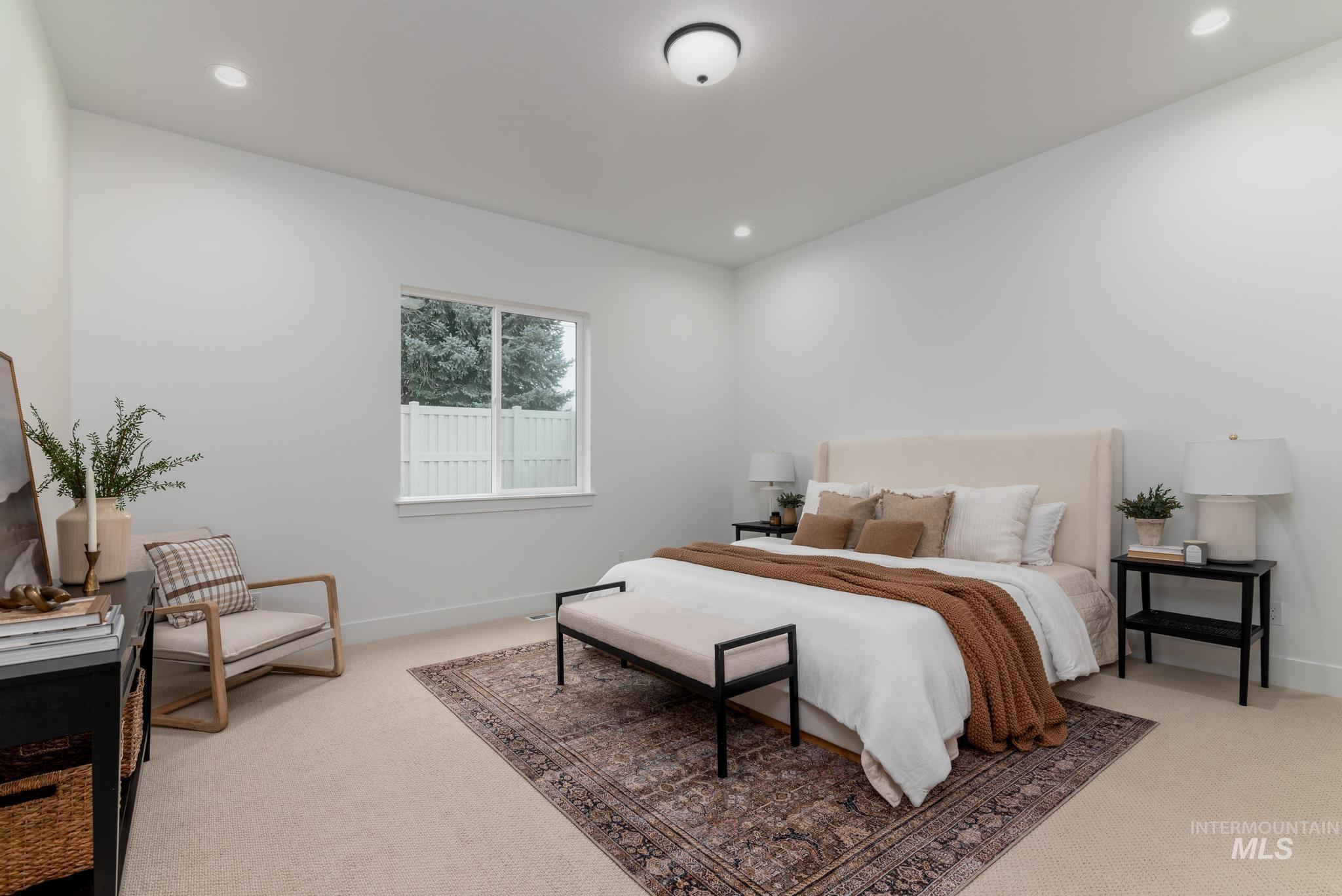 9044 West Purple Martin Street Star, ID 83669 - Photo 8 of 14 Bedroom featuring light colored carpet and recessed lighting