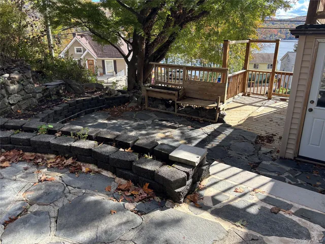 a view of a bench in a backyard