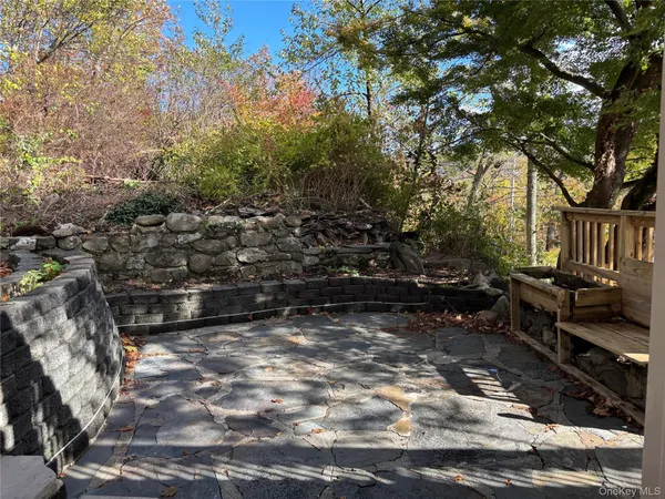 a view of a bench in a yard