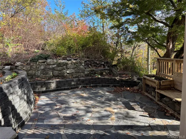 a view of a bench in a yard
