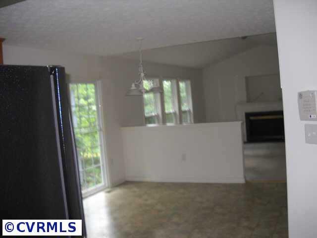 278 Cedar Ridge Drive Ruther Glen, VA 22546 - Photo 3 of 7 a view of an empty room and window