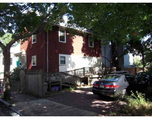 a car parked in front of a house